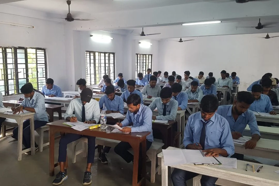 a group of students writing assignment in jiaganj college of engineering and technology